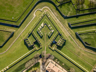 Aerial view of Pamplona fortress with multi level bastions, ditch, moat, battlements in Navarra, Spain in the middle of a green park