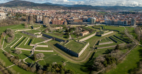 Aerial view of Pamplona citadel with blue clodu sky background on a spring morning with bastions,...