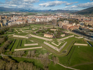 Aerial view of Pamplona citadel with blue clodu sky background on a spring morning with bastions,...