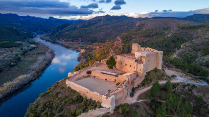 Fototapeta na wymiar Aerial view of Miravet templar crusader castle and ebro river province of tarragona Spain. Miravet is one of the most picturesque villages in Spain.