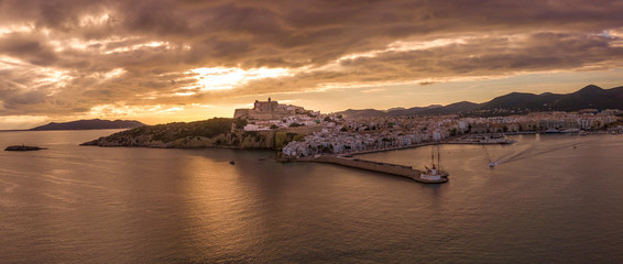 Ibiza old town panorama aerial shot with sunset
