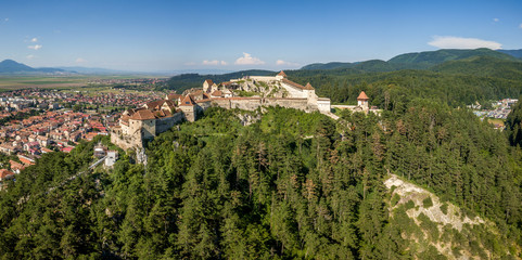 Aerial panorama of Rasnov ruined medieval castle in Transylvania Romania with towers, bastions,...