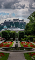 Naklejka premium Panoramic view of Salzburg with castle, cathedrl and dramatic sky 