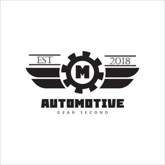 Letter M Creative Automotive Logo Design Template with wing symbol and black background
