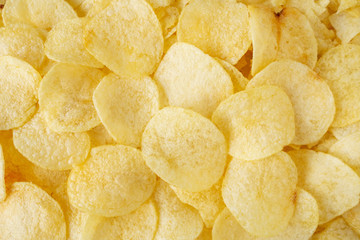 crispy potato chips snack texture background top view