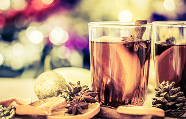 Mulled wine in night celebration of  New Year party and delicious Christmas drink for autumn and a winter season
