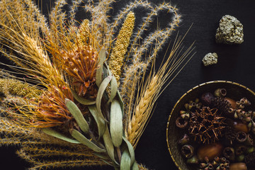 Dried Feather Grass and Flowers with Brass Bowl of Seeds and Pyrite