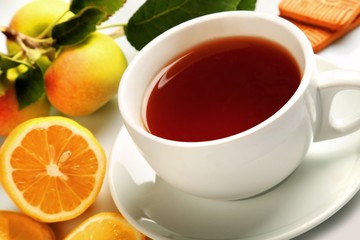 Hot drink with lemons and cookies