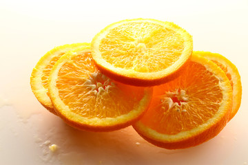 Orange Slice on white background / Orange is a citrus fruit that is quite delicious, juicy with high content Vitamin C. 