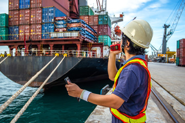 loading master, harbor controller in charge of containers shipment in port terminal, command by...