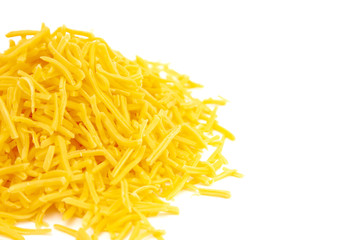 Pile of Grated Cheddar Cheese on a White Background
