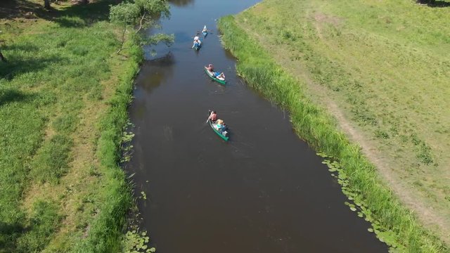 canoeing in the river, drone shot