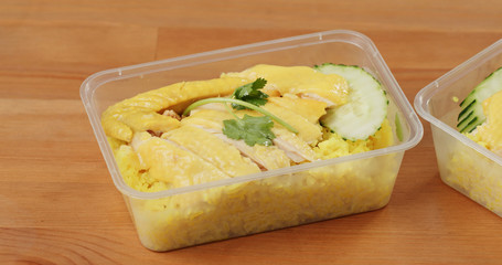Hainanese chicken rice in take away box