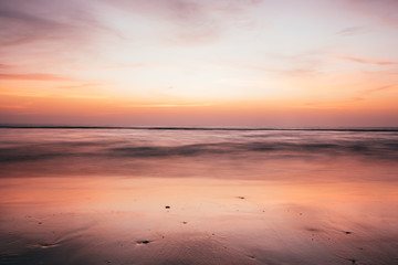 Fototapeta na wymiar Dramatic Sky And Beach Long Exposure Shot