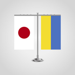 Table stand with flags of Japan and Ukraine.Two flag. Flag pole. Symbolizing the cooperation between the two countries. Table flags