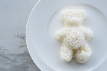 Teddy Bear Shaped Steamed White Rice Served On White Plate