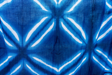 Tie batik dyeing tie batik indigo color or mauhom color on fabric background