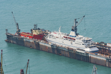 ship being renovated in shipyard