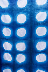 Tie batik dyeing tie batik indigo color or mauhom color on fabric background
