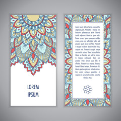 Greeting card or Invitation template with ethnic mandala ornament. Hand drawn illustration