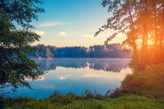 Early Morning, Sunrise Over The Lake. Rural Landscape, Wilderness. Beautiful Nature Of Finland, Europe