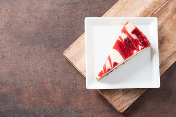strawberry raspberry swirl cheesecake slice 