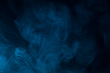 Colorful smoke close-up on a black background