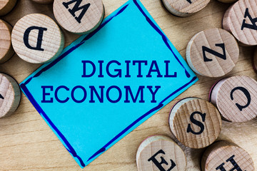 Word writing text Digital Economy. Business concept for worldwide network of economic activities...
