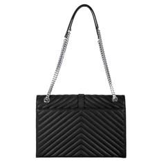 Leather black female bag with diagonal embossing and silver large chain
