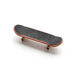 Fingerboard. A small skateboard. Close up. Isolated on white background.