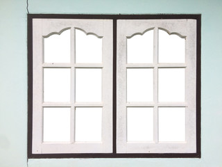 White wooden window for homes on the cement wall.