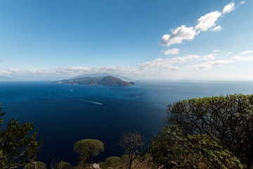 Beautiful aerial view of Napoli gulf from Capri island, with boat trails on the water