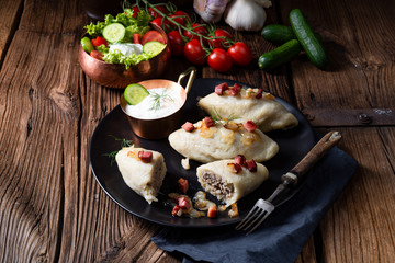 Rustic Cepelinai, a specialty Lithuanian and Polish cuisine.