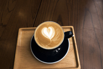 Latte on a wooden table