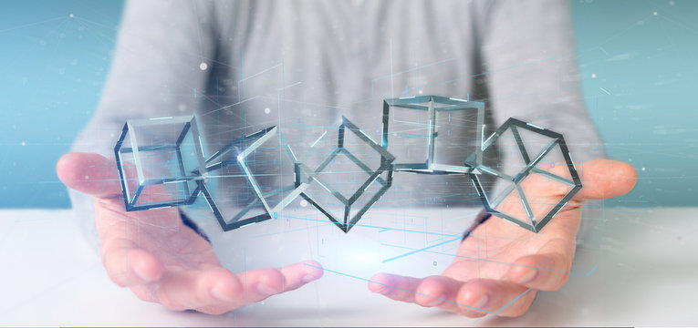 Man holding a 3d rendering blockchain cube isolated on a background