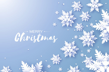 Merry Christmas and Happy New Year Greetings card. White Paper cut snowflakes. Origami Winter Decoration background. Seasonal holidays. Snowfall. Space for text. Blue.