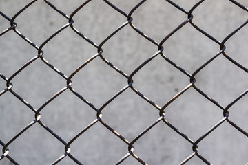 Fototapeta premium The texture of the wire fence. Can be used as a background