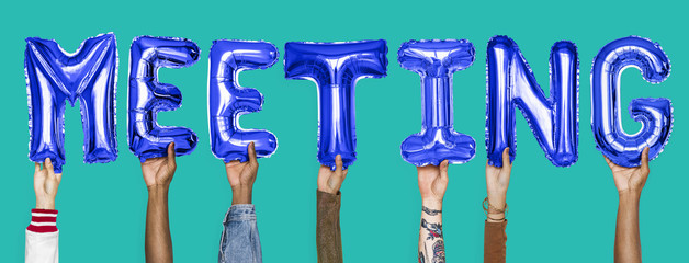 Hands showing meeting balloons word