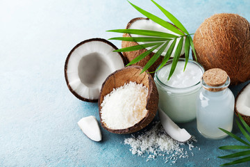 Organic coconut products for spa, cosmetic or food ingredients decorated palm leaves. Natural oil,...