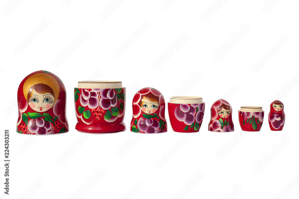 Wall mural Matryoshka Russian doll souvenir  bright red on white background isolated closeup