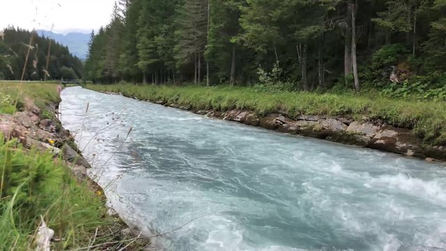 The beautiful Reichenbach flowing through the scenic Rosenlaui valley.
