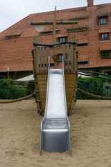 frontal view on metal slide on child playground
