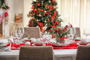 Table served for Christmas dinner in living room