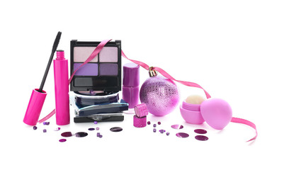 Set of cosmetics with Christmas decorations on white background