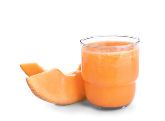 Glass of fresh melon smoothie on white background