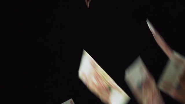 Banknotes five thousand rubles fall on black background slow motion stock footage video