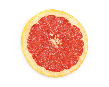 Grapefruit slice isolated on white background, top view