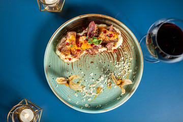 Delicious duck breast with mash potato and fruits on porcelain, Fine gastronomy
