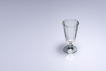 Empty glass on white background
