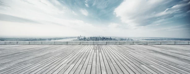 Fotobehang lege vloer met modern stadsbeeld in new york © zhu difeng